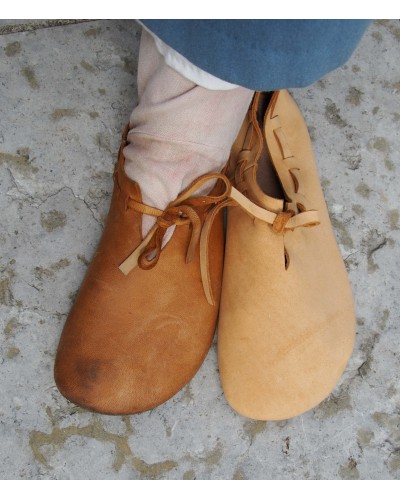 (A) soft laced shoes from deerskin, medieval cut