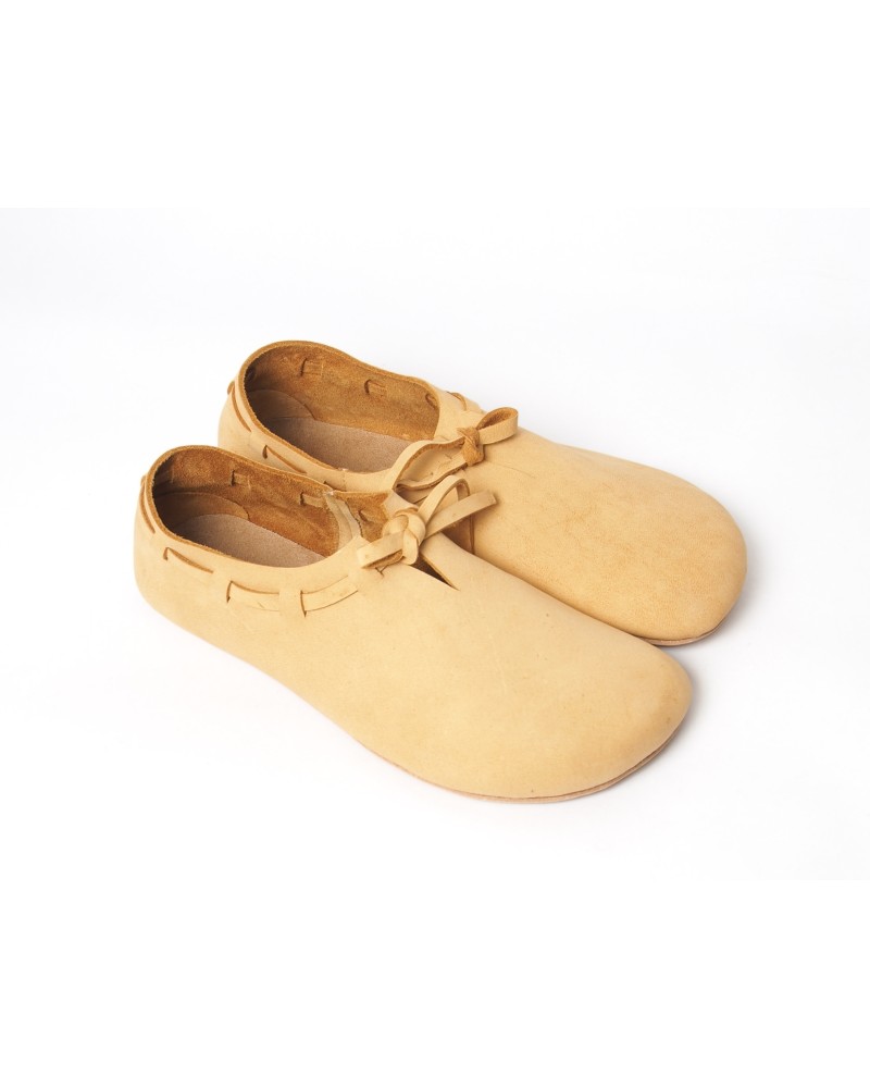 (A) soft laced shoes from deerskin, medieval cut